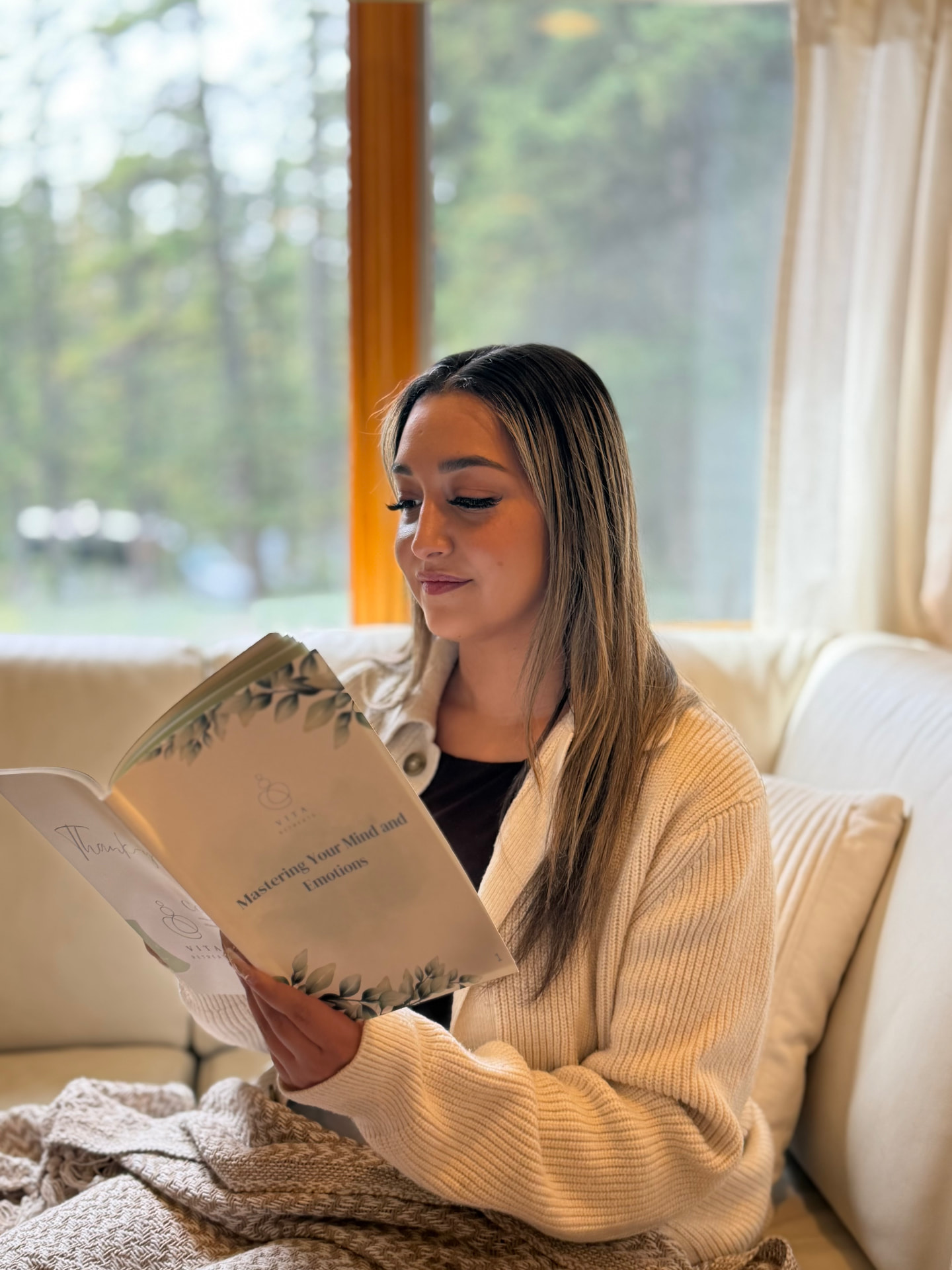 A guest reading quietly during a Vita retreat